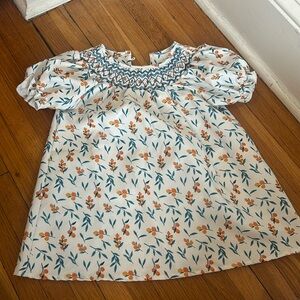 Smocked dress with orange blossoms, button back 2T
